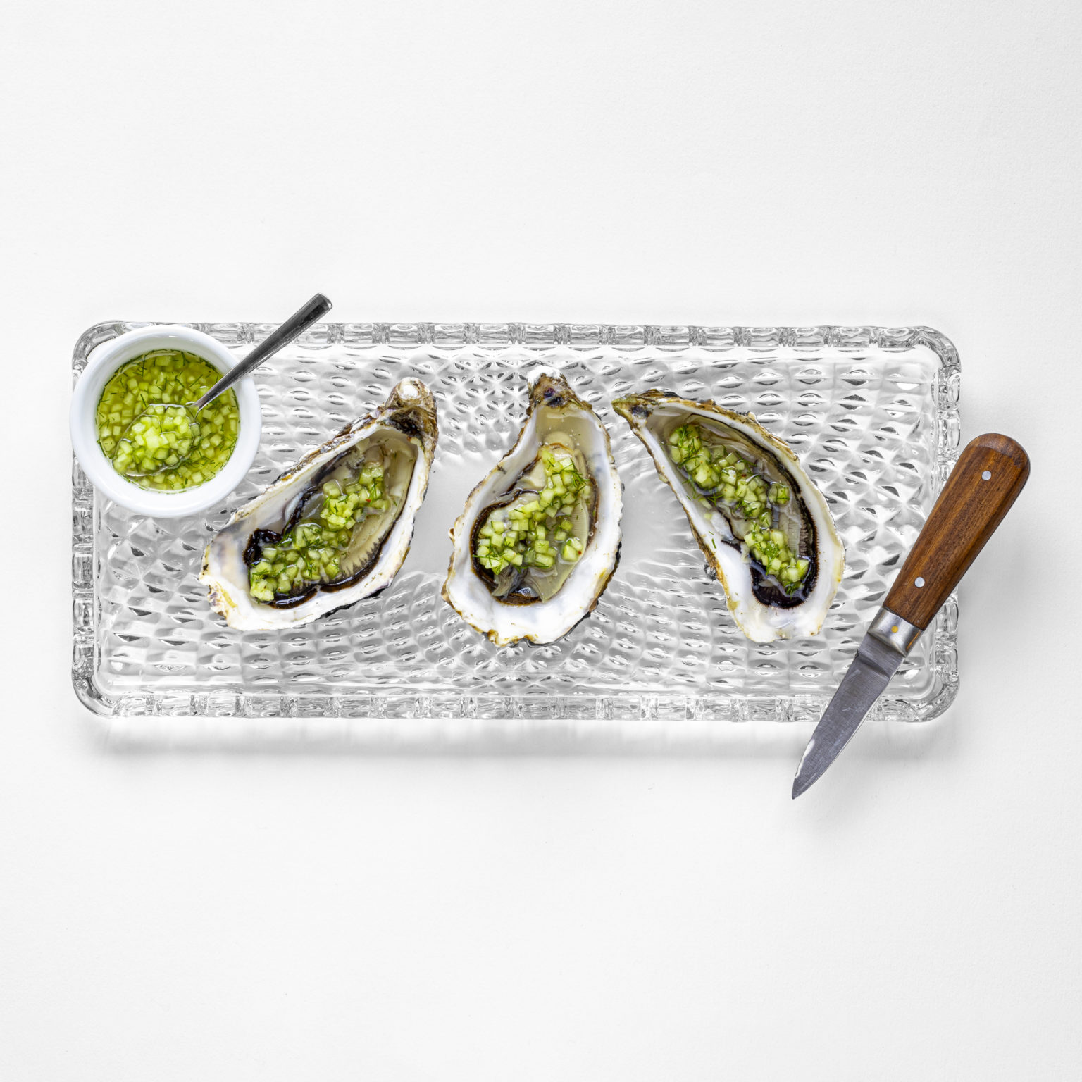 Austern mit GurkenFenchelVinaigrette Perlage à trois